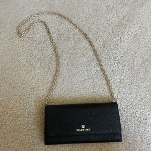 Mario Valentino wallet on a chain